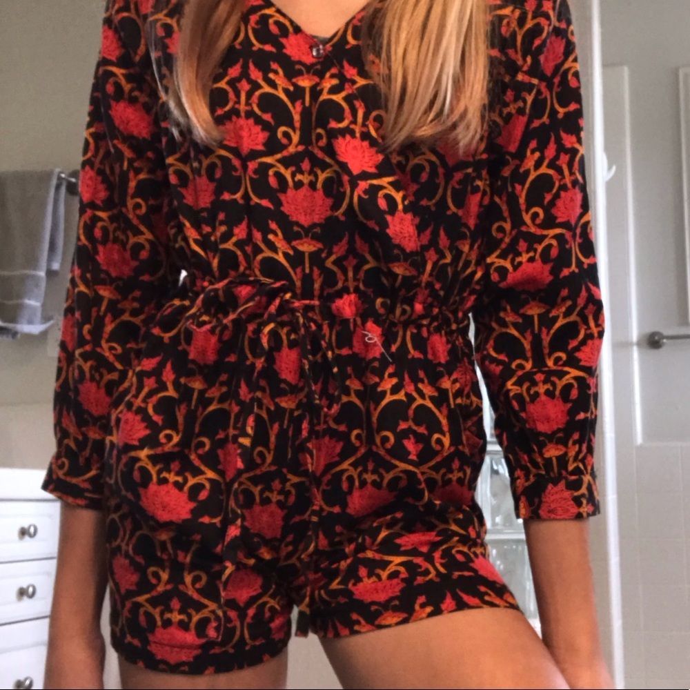 Gorgeous long sleeve red and orange formal romper
